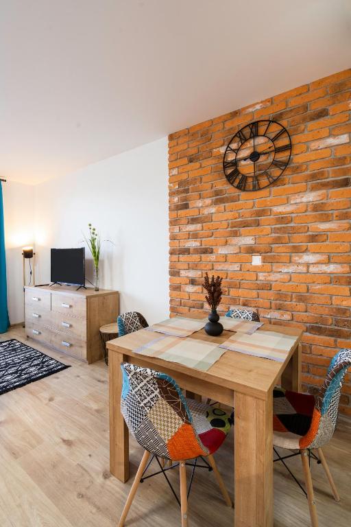 TV a/nebo společenská místnost v ubytování Apartmán 101 Vila Zuberec