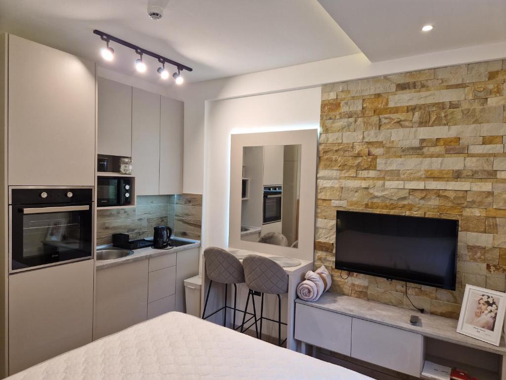 Kuchyň nebo kuchyňský kout v ubytování Apartmani Srna Milmari