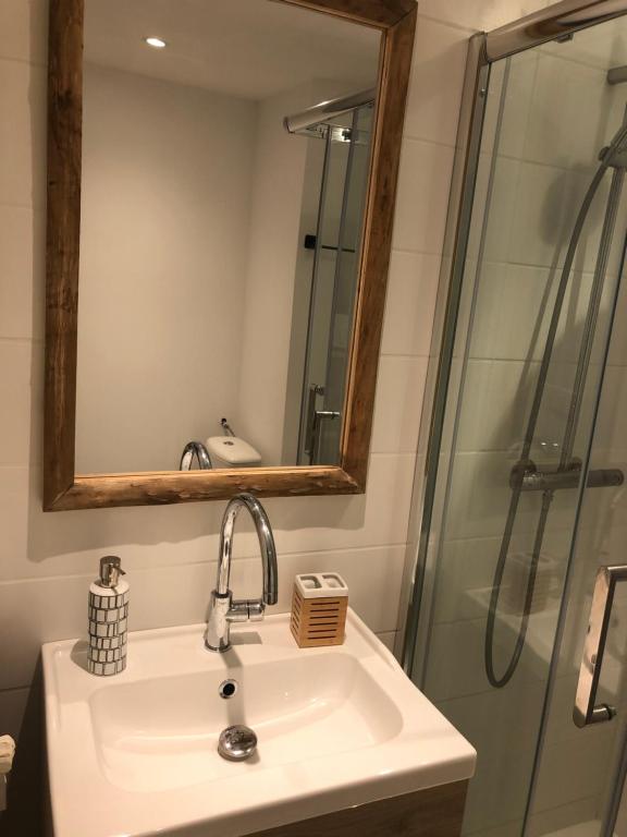 a bathroom with a sink and a shower at Large apartment near the beaches of Mourillon in Toulon