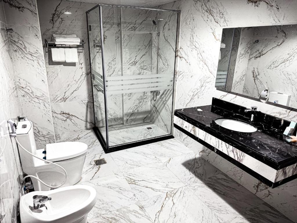 Koupelna v ubytování Al Massa Hotel