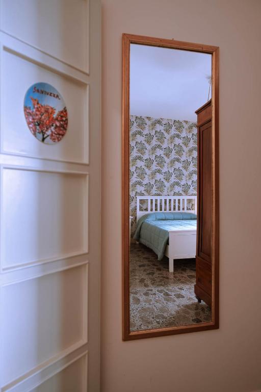 Postel nebo postele na pokoji v ubytování B&B Cumpari Turiddu