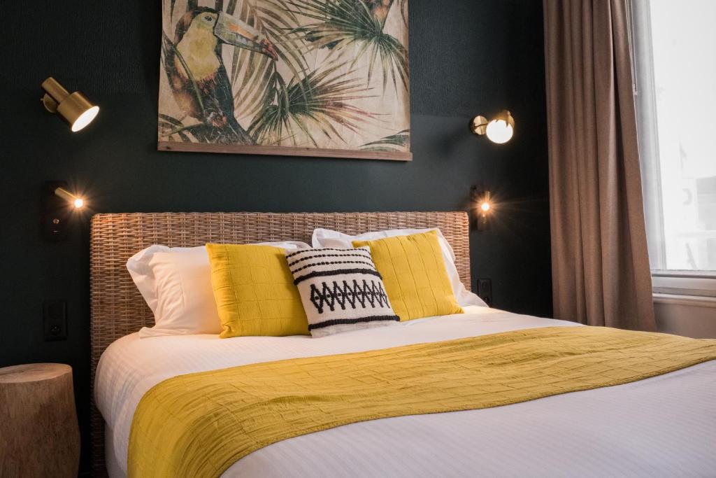Кровать или кровати в номере Hôtel Le Patio - Deauville