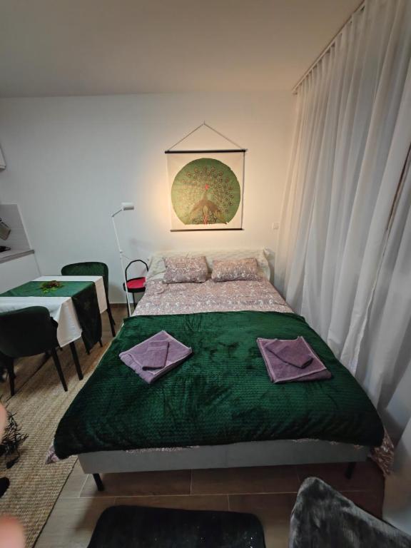 Postel nebo postele na pokoji v ubytování Divčibare Jezero apartman 25