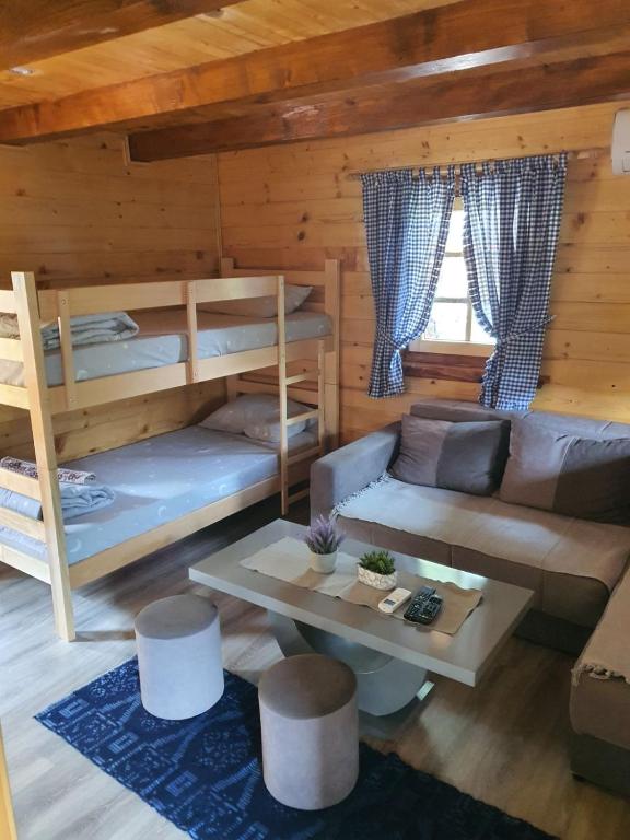 Postel nebo postele na pokoji v ubytování Etno kutak Milojevic