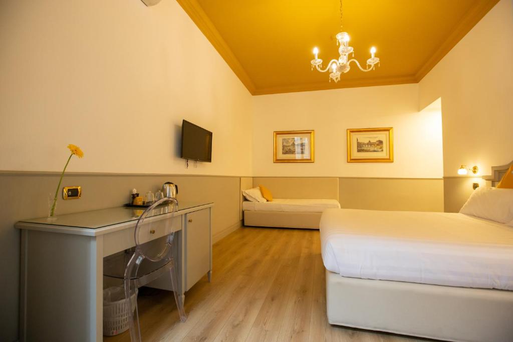 A television and/or entertainment centre at Duelle Vatican Suite