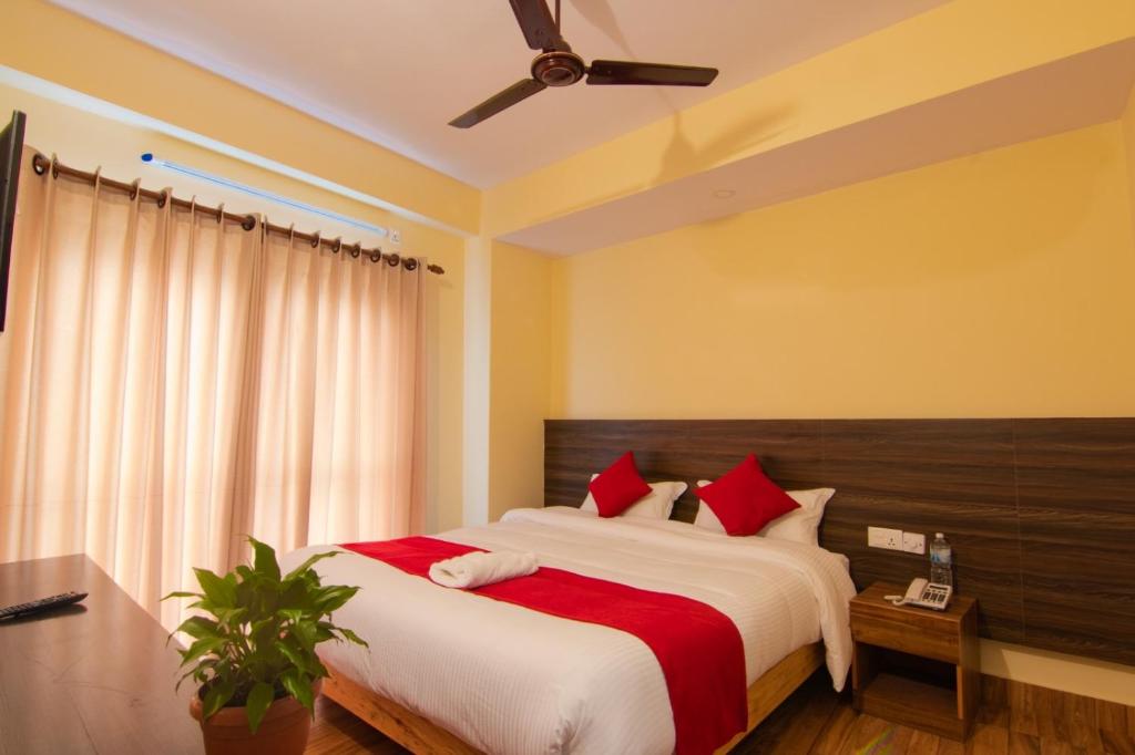 Postel nebo postele na pokoji v ubytování Hotel bivhuti