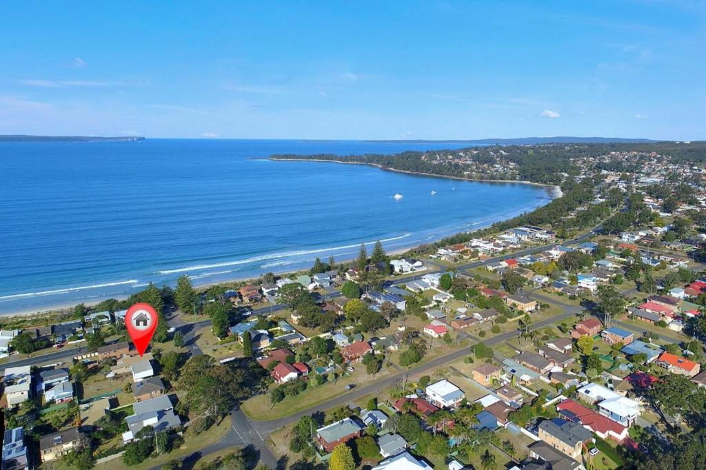 an aerial view of a suburb with a red balloon at Berry by The Bay in Vincentia