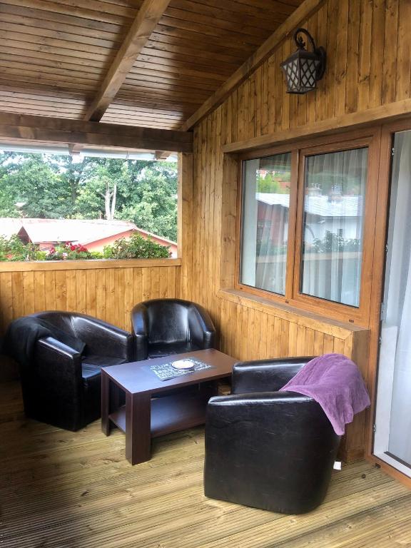 Istumisnurk majutusasutuses BUCEGI VIEW APARTAMENT
