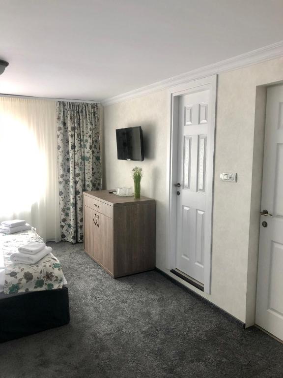 Voodi või voodid majutusasutuse BUCEGI VIEW APARTAMENT toas