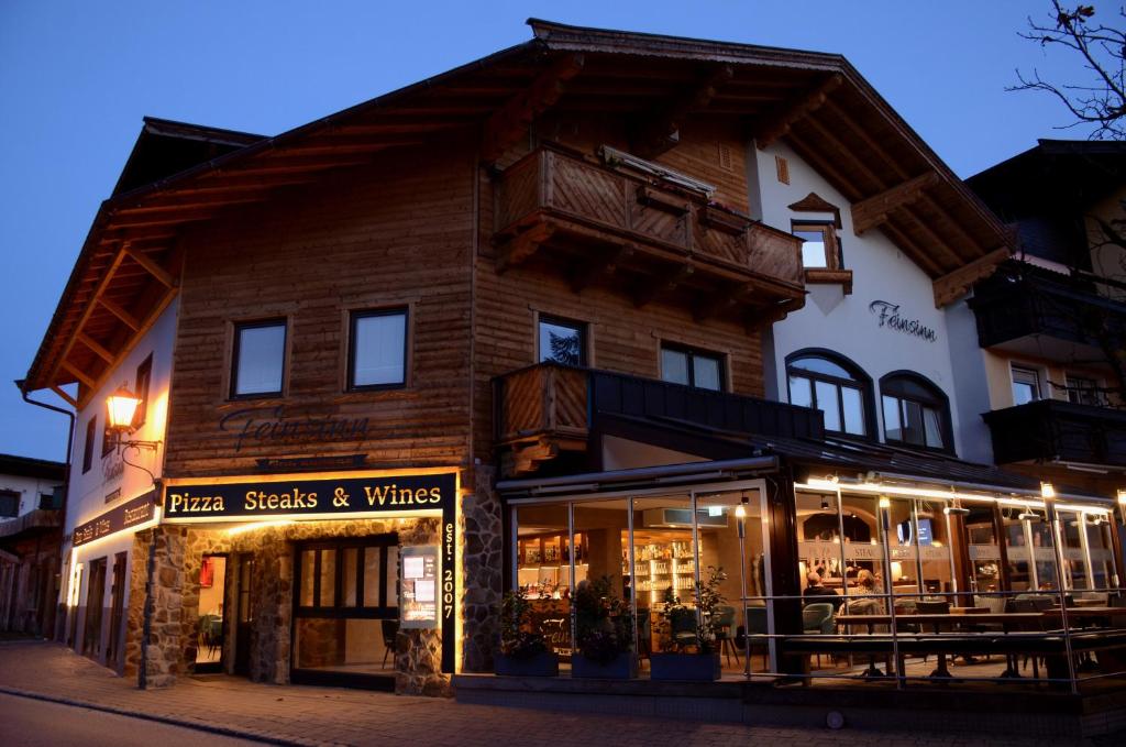 a building with a store in front of it at Appartement Feinsinn in Westendorf