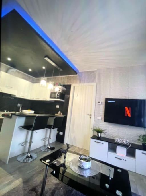 Televízia a/alebo spoločenská miestnosť v ubytovaní Dave’s house