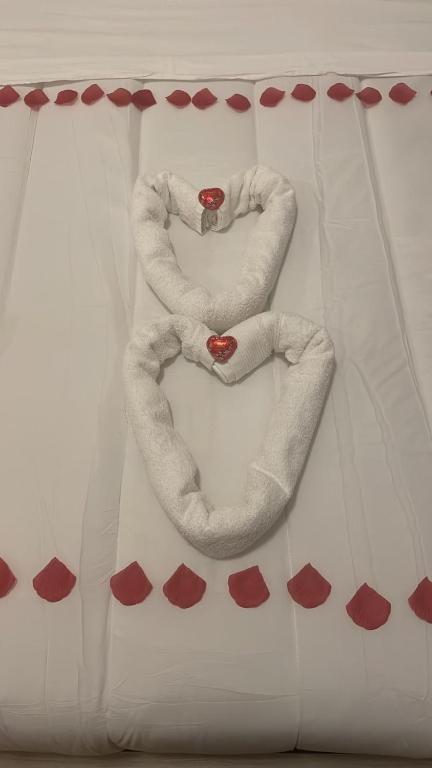 A bed or beds in a room at All Suite Colosseo