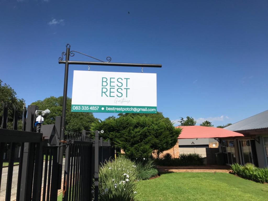 a sign that reads best rest in a yard at Cosy - Best Rest Potch in Potchefstroom
