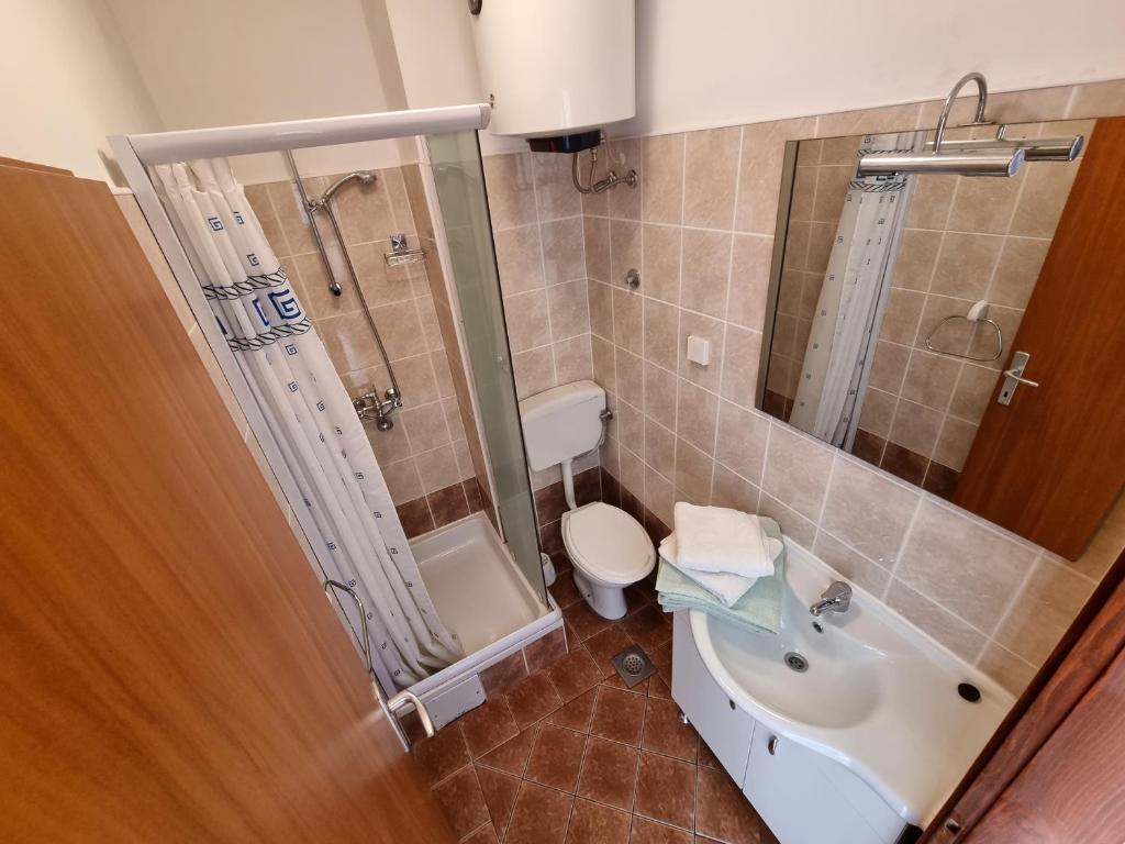 Kúpeľňa v ubytovaní Apartments CHIARA