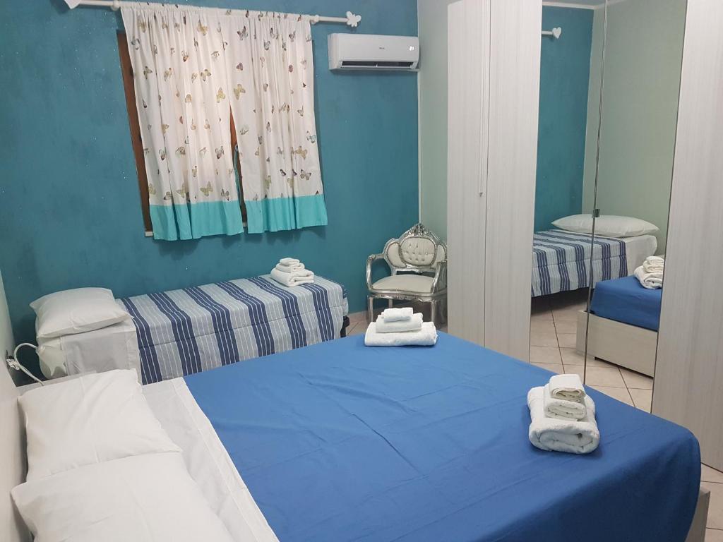Posteľ alebo postele v izbe v ubytovaní Just Pompei Holiday House