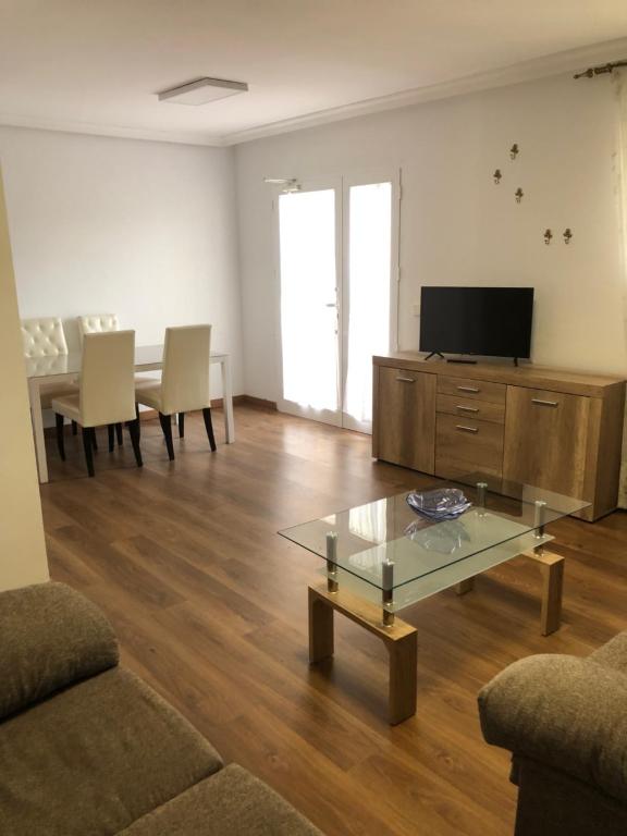 TV a/nebo společenská místnost v ubytování Apartamentos Nicaragua