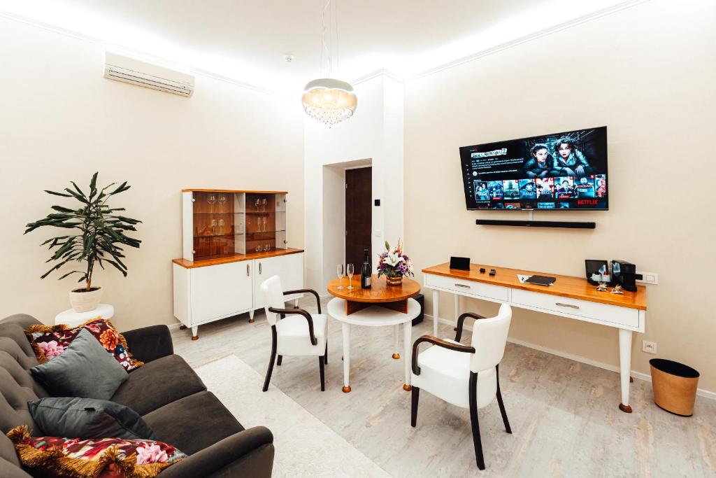 TV a/nebo společenská místnost v ubytování Hotel Baltaci Atrium