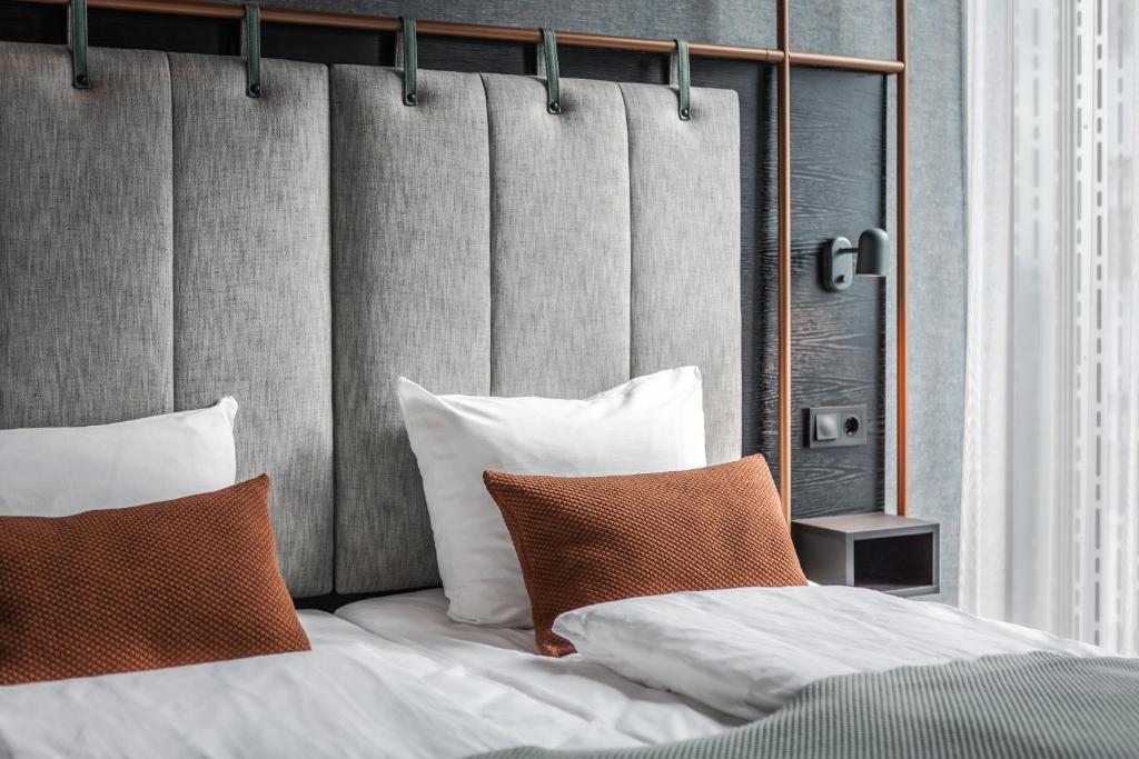Postel nebo postele na pokoji v ubytování Quality Hotel Hasle Linie