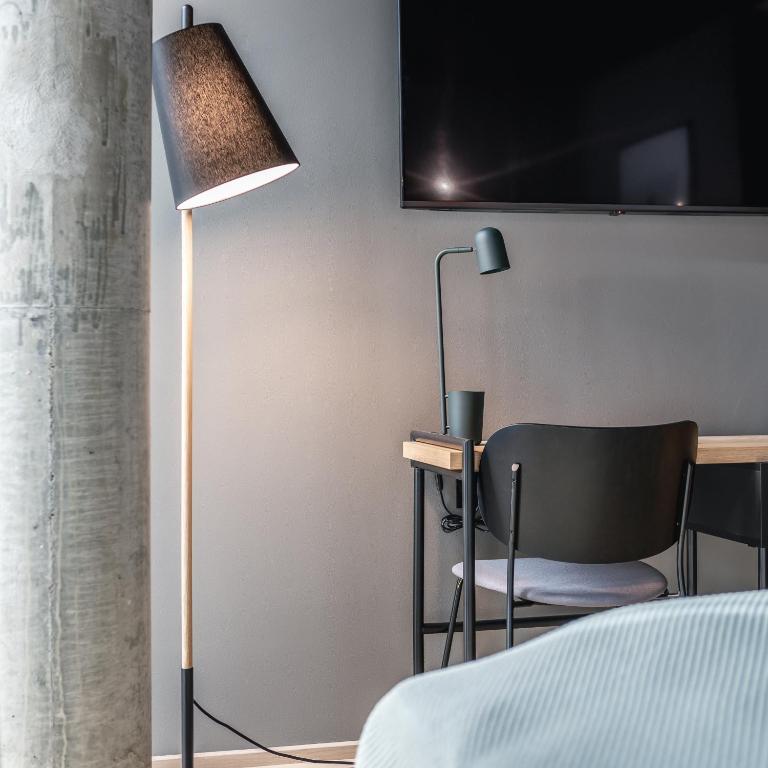 Postel nebo postele na pokoji v ubytování Quality Hotel Hasle Linie