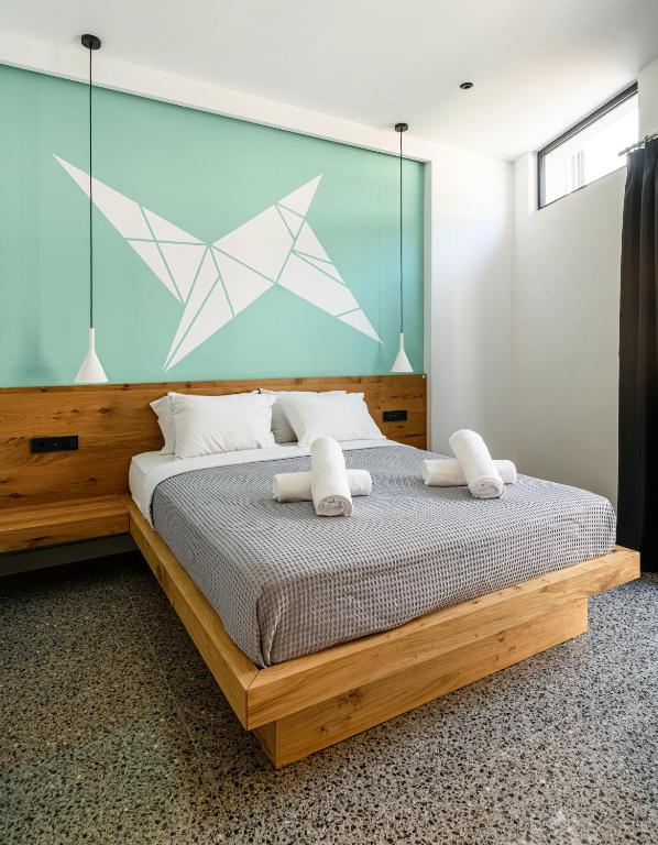 Letto o letti in una camera di Mosaikon