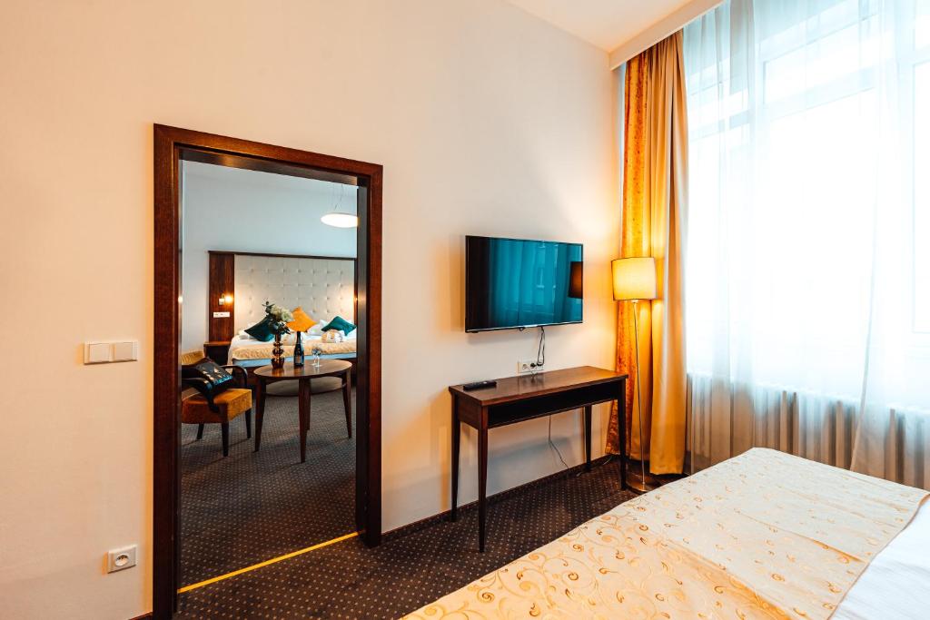 TV a/nebo společenská místnost v ubytování Hotel Baltaci Atrium