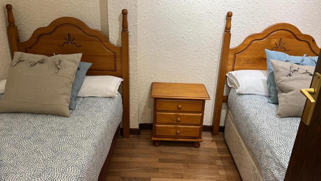 Postel nebo postele na pokoji v ubytování Casa Tere Panticosa