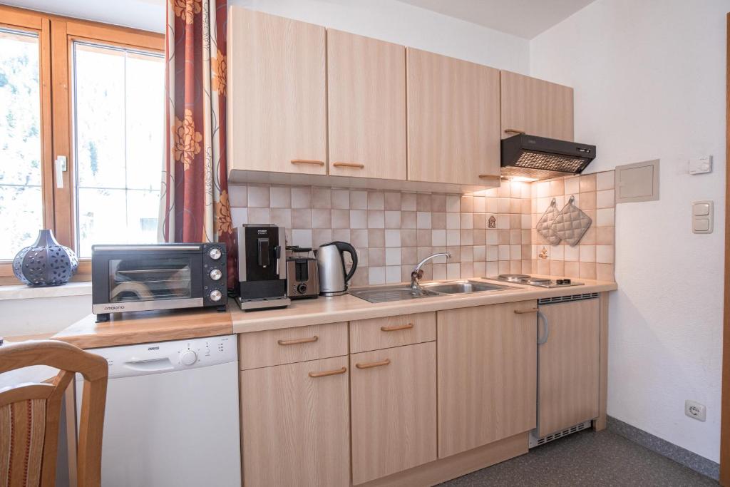 A kitchen or kitchenette at Sportapart Schweighofer Ski-in & Ski-out