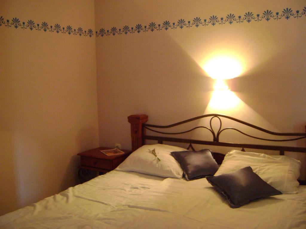 Postel nebo postele na pokoji v ubytování Merkež Guest House
