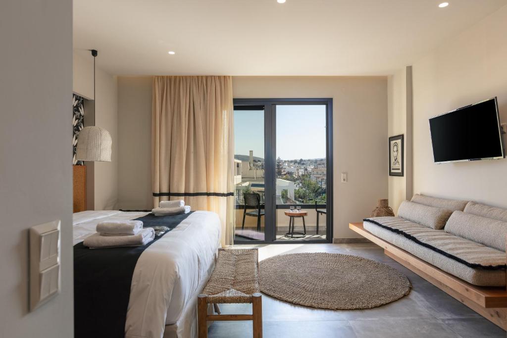 Voodi või voodid majutusasutuse Chapter 02 Gallery Suites toas