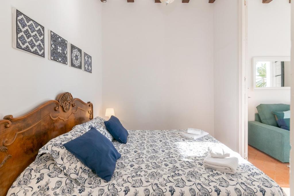 Postel nebo postele na pokoji v ubytování Vistamar 1: Primera línea de mar con encanto