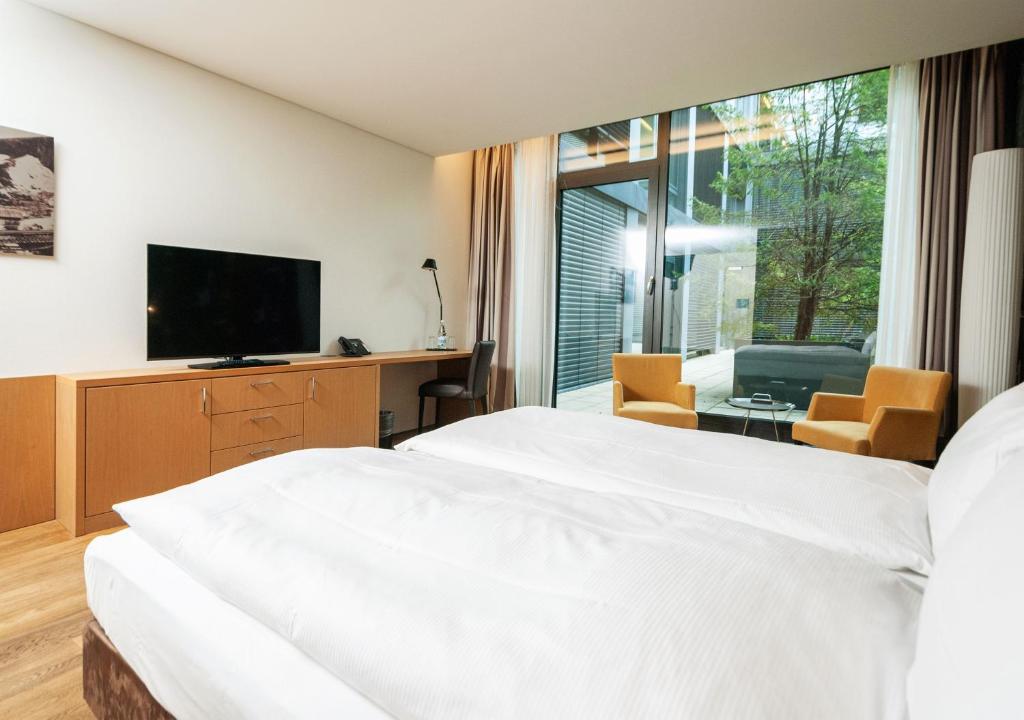 TV a/nebo společenská místnost v ubytování Tailormade Hotel SIHLPARK Schindellegi