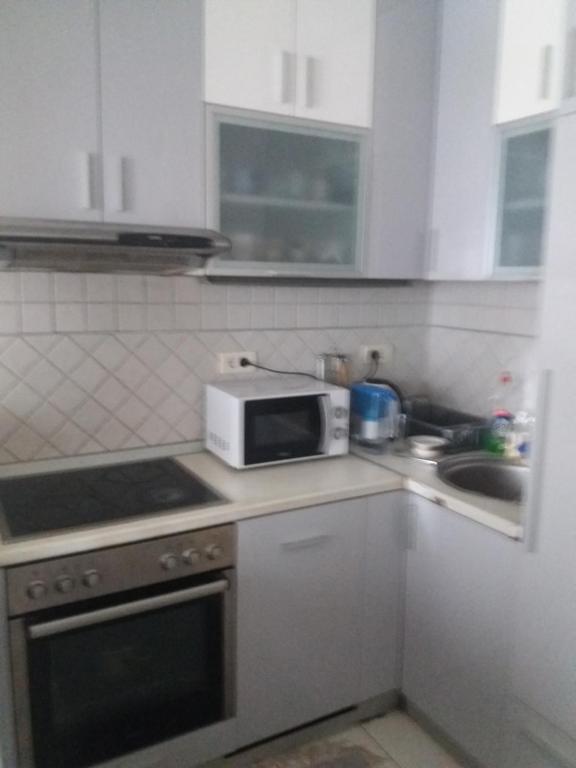 Kuchyň nebo kuchyňský kout v ubytování Sava Centar