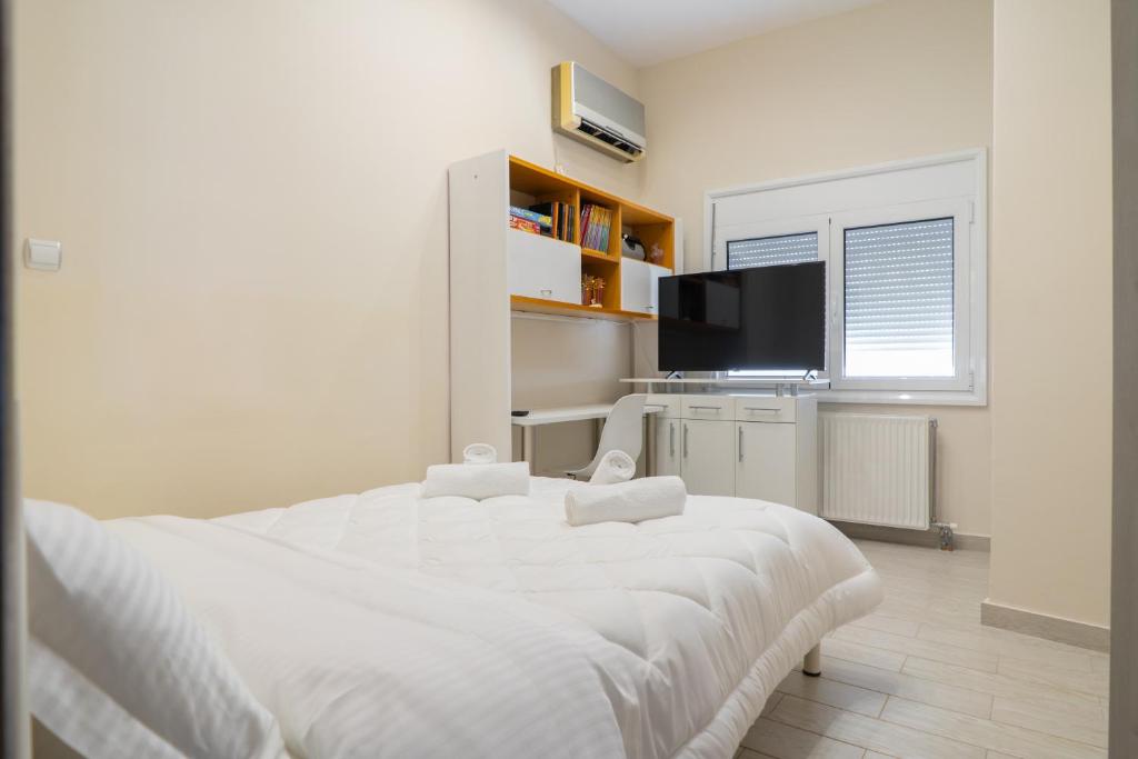 Postel nebo postele na pokoji v ubytování Villa Alpha Sea View