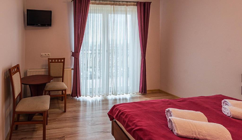 Posteľ alebo postele v izbe v ubytovaní willapieninska