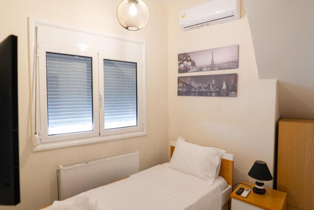 Postel nebo postele na pokoji v ubytování Villa Alpha Sea View