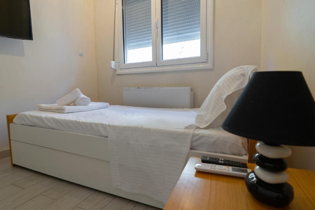 Postel nebo postele na pokoji v ubytování Villa Alpha Sea View