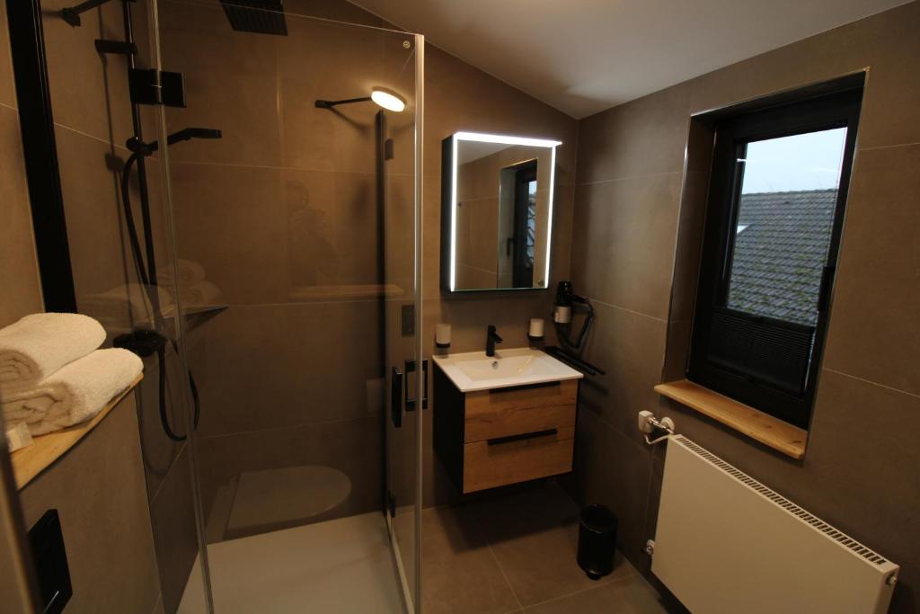 Koupelna v ubytování DER Hirsch Hotel