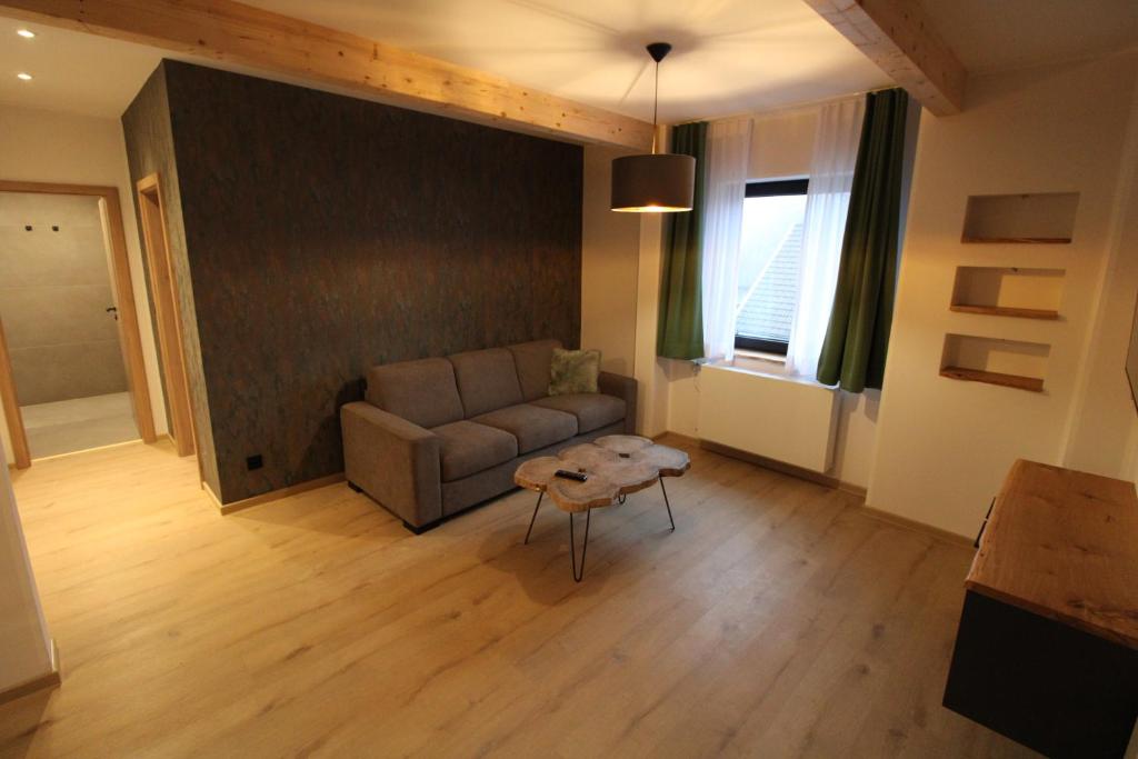 Posezení v ubytování DER Hirsch Hotel