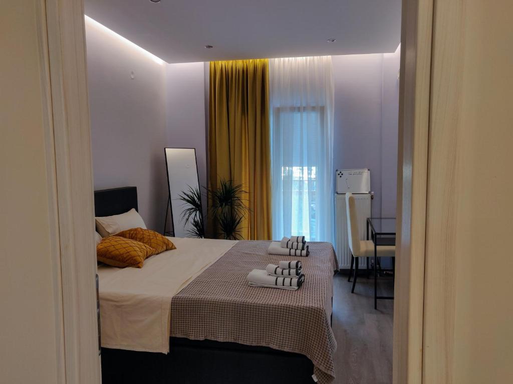 Posteľ alebo postele v izbe v ubytovaní Luxury Suites with KING-SIZED bed
