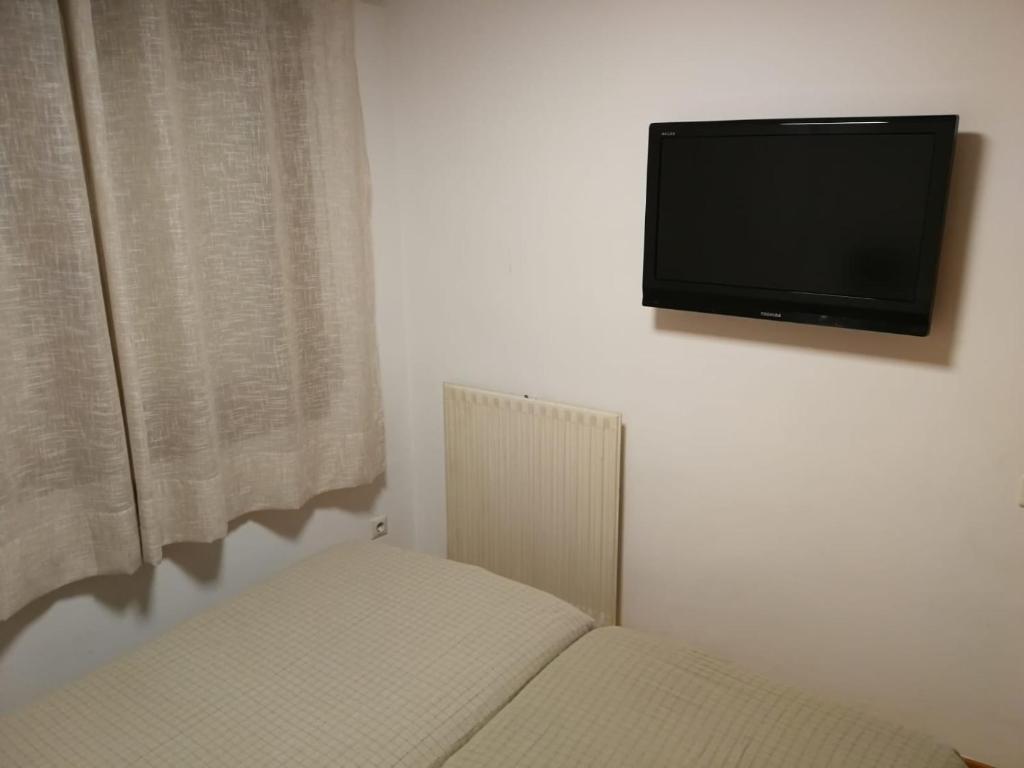 TV a/nebo společenská místnost v ubytování APARTMENT NATURA