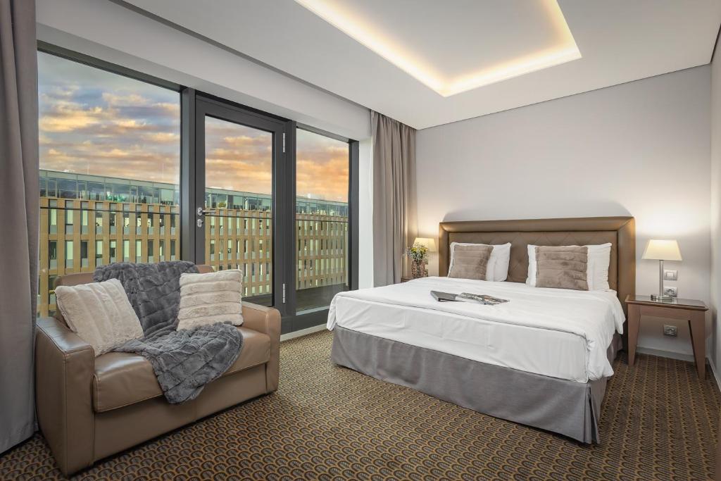 Postel nebo postele na pokoji v ubytování Hotel Royal Prague