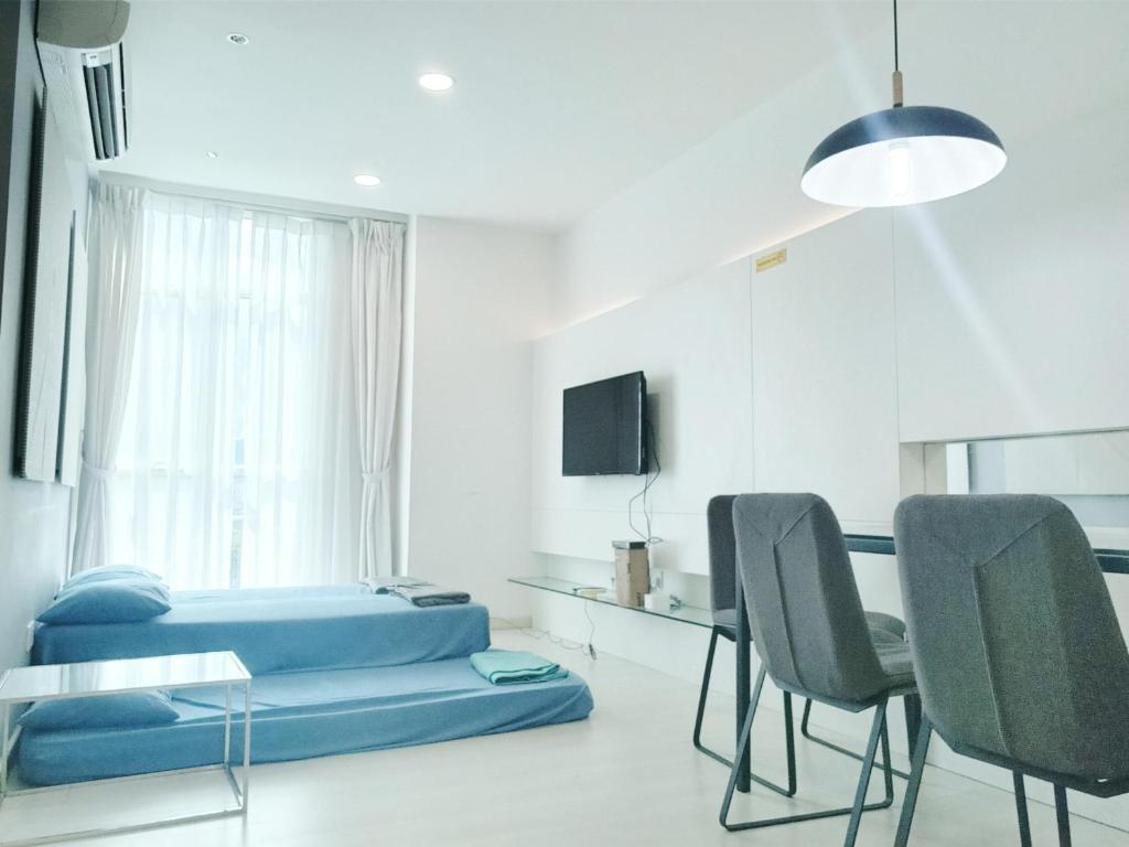 Et tv og/eller underholdning på Deluxe Suites Stay, Netflix,2BR,