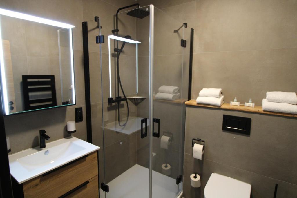 Koupelna v ubytování DER Hirsch Hotel