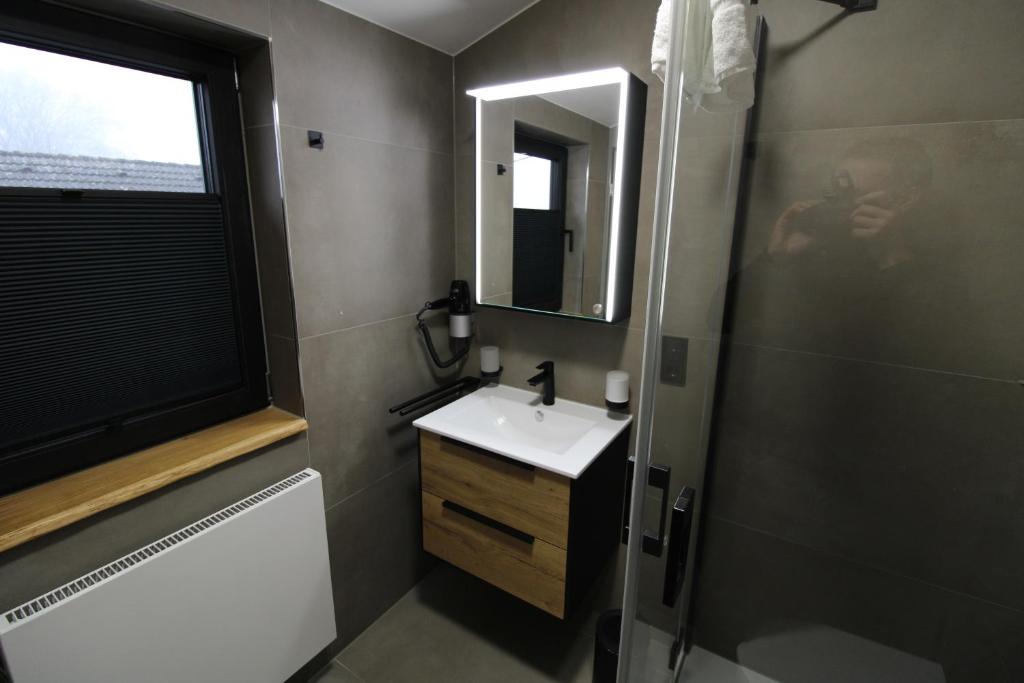 Koupelna v ubytování DER Hirsch Hotel