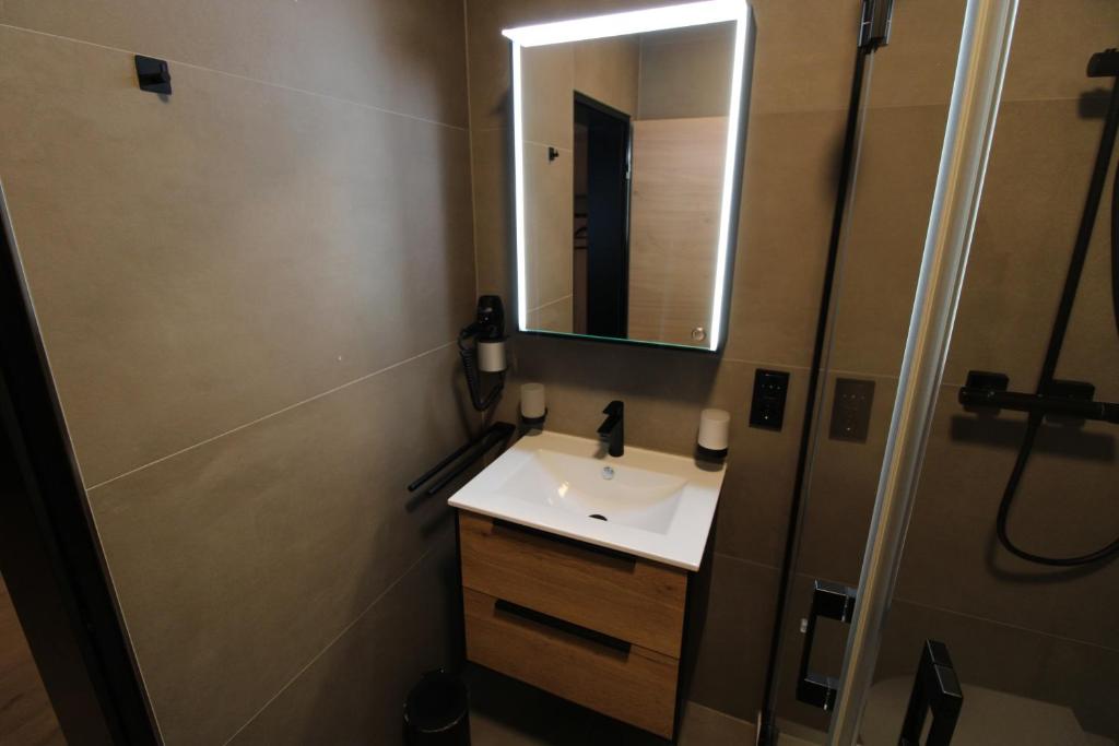 Koupelna v ubytování DER Hirsch Hotel