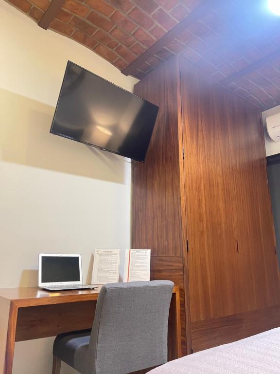 TV a/nebo společenská místnost v ubytování Hotel NG
