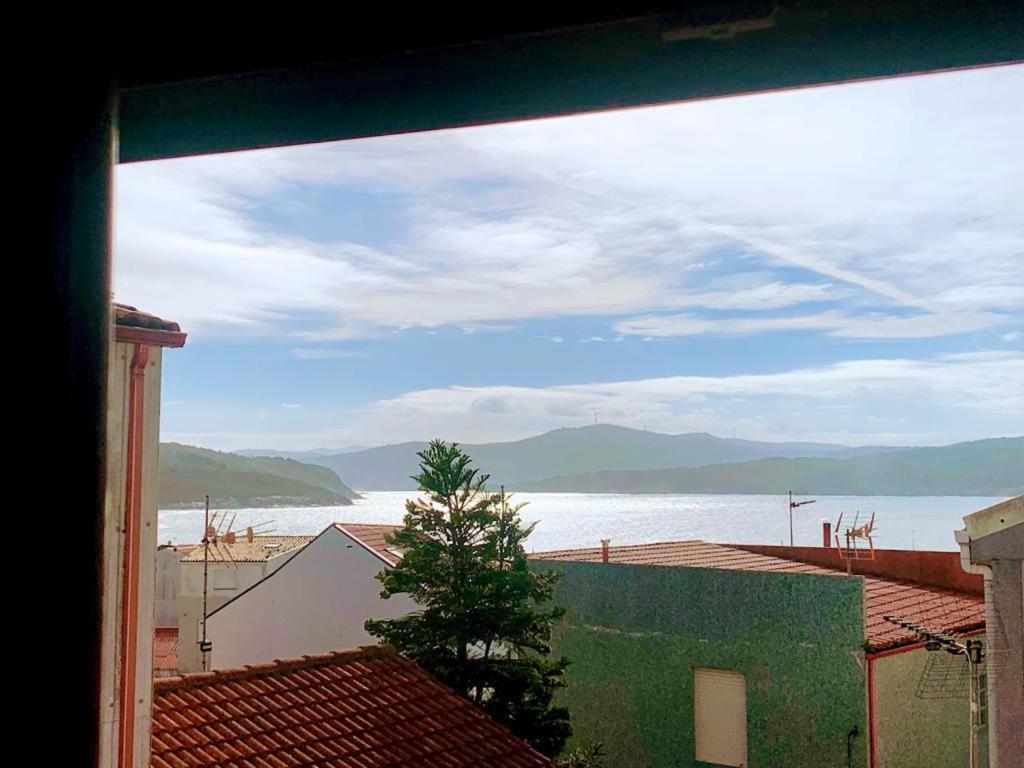 a view of a large body of water from a building at Welcoming House with Sea View in Corme-Porto in Corme-Puerto