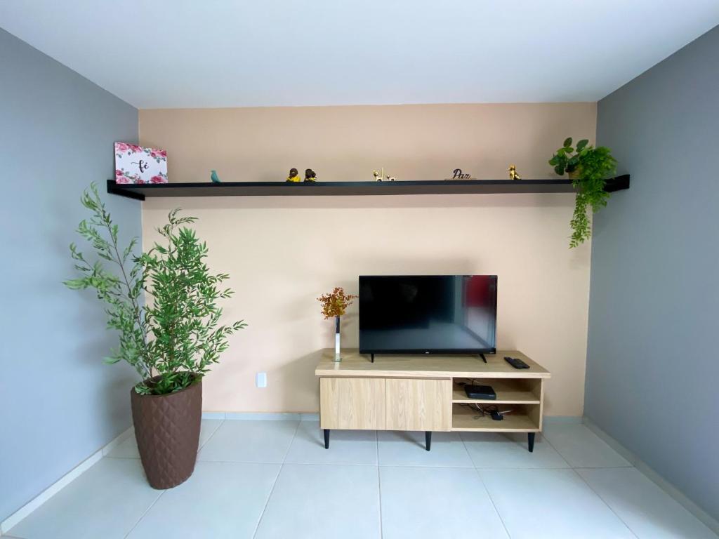 TV a/nebo společenská místnost v ubytování Apartamento de 01 quarto, novíssimo, em Ipiabas.