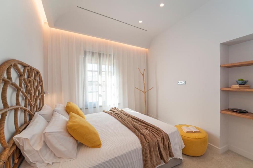 Postel nebo postele na pokoji v ubytování Naillac Elite Suites