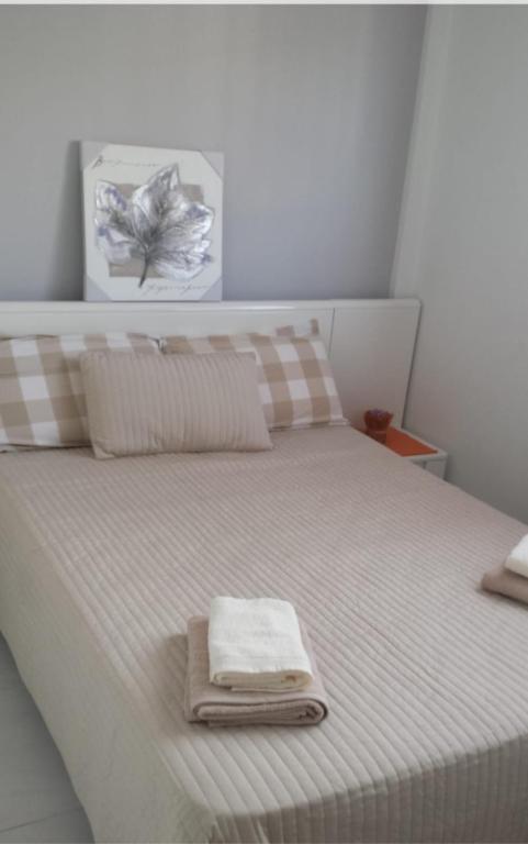 Postel nebo postele na pokoji v ubytování La Zenia Sabrina Apartment 5